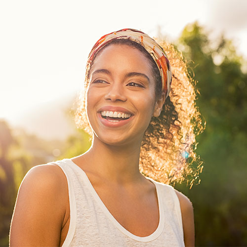 young woman with dental bonding restorative dentistry in Brampton