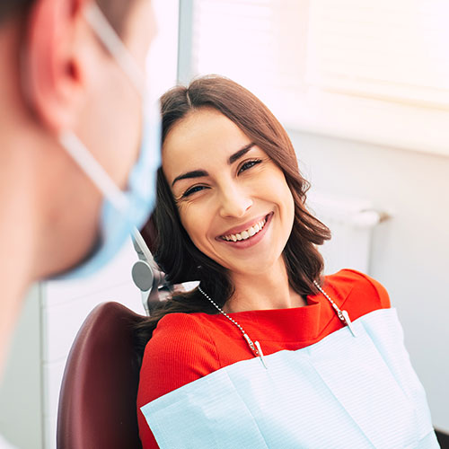 smiling woman with Brampton dentist