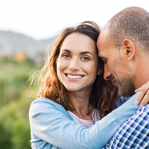 mature couple laughing together